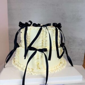 Vintage Two-Tier Cake with Black Satin Bows